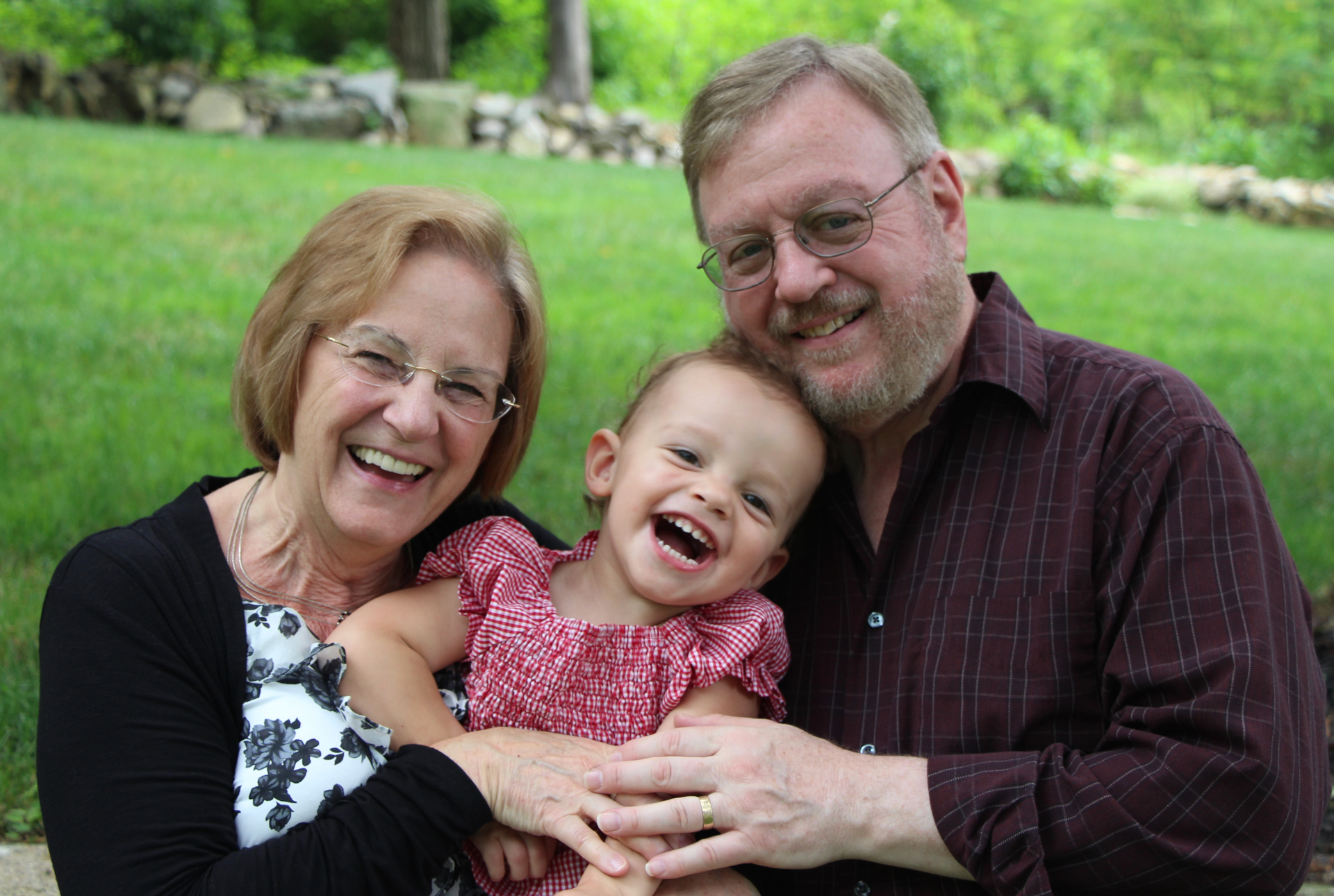 Michele and Marv Wainschel — Nana and Opa — with one of their grandchildren